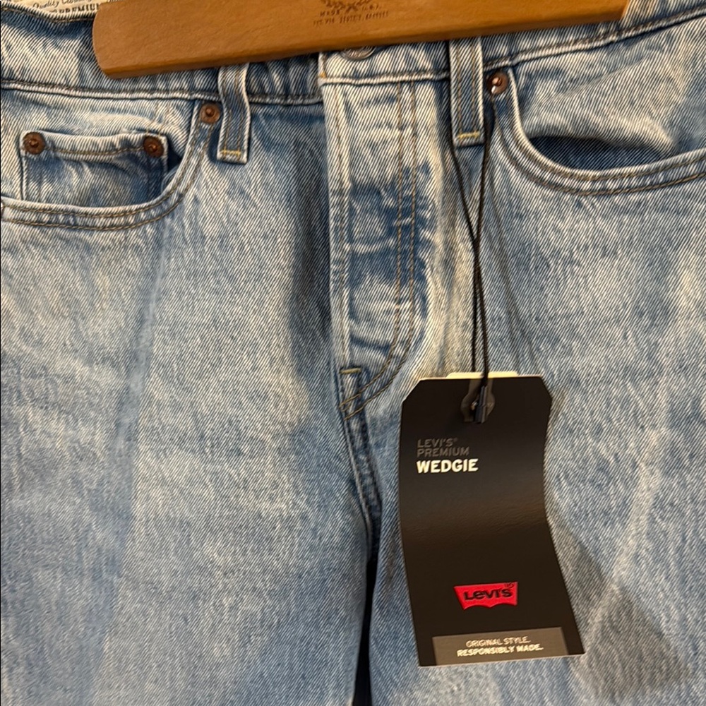 Levi's Blue High Rise Jeans with Vintage Distressed Style